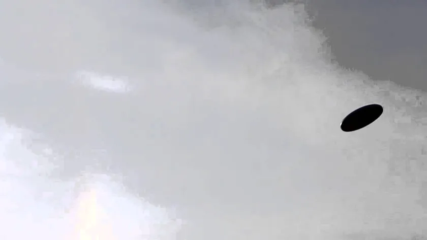 Video thumbnail: a frisbee sailing alone against a cloudy sky
